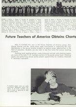 Load image into Gallery viewer, Black and white photograph of a group photo with text about Future Teachers of America obtaining a charter. 1964 Canfield High School Yearbook in Mahoning County, Ohio
